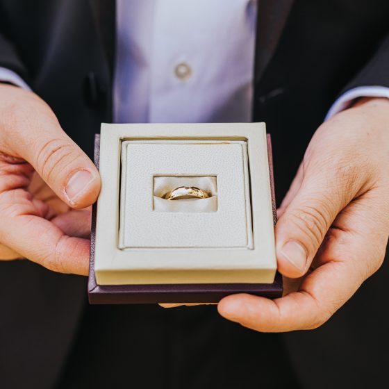 This gorgeous wedding band being held by the groom was simple and elegant. The box added another element of class as the bride and groom prepared to exchange their vows and their rings. #weddingphotography #miamiphotographer #southflorida #floridakeys #weddingphotographer #samsaragardens #gardenwedding #gettingmarried #floridawedding #culturalwedding #southfloridaphotographer